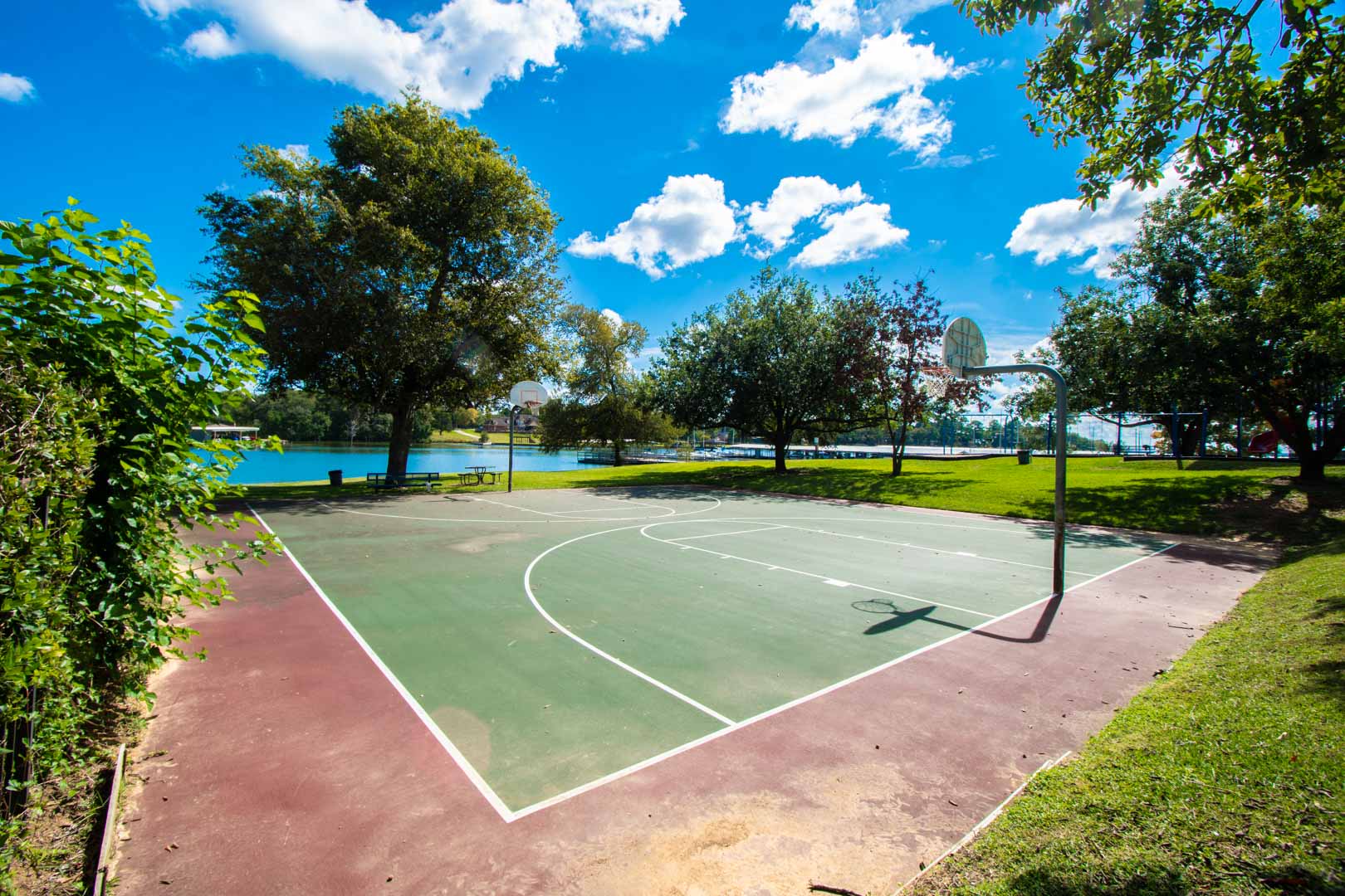 Outdoor basketball courts at VRI's Landing at Seven Coves in Willis, TX.